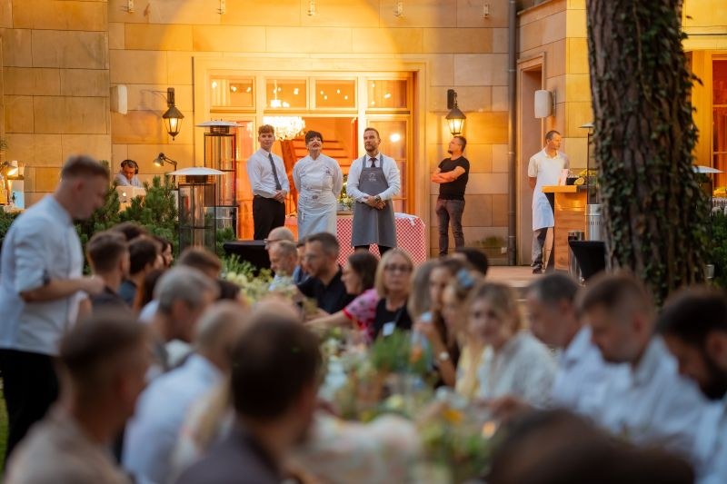 Guests at tables during a garden event