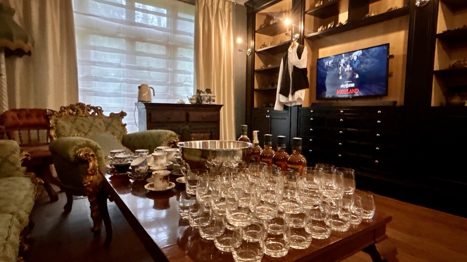 Glasses and place settings prepared for a celebration
