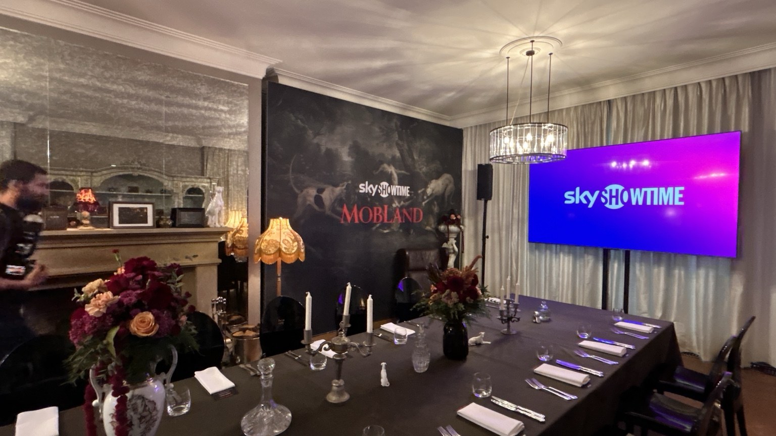 Interior with screen prepared for a promotional meeting