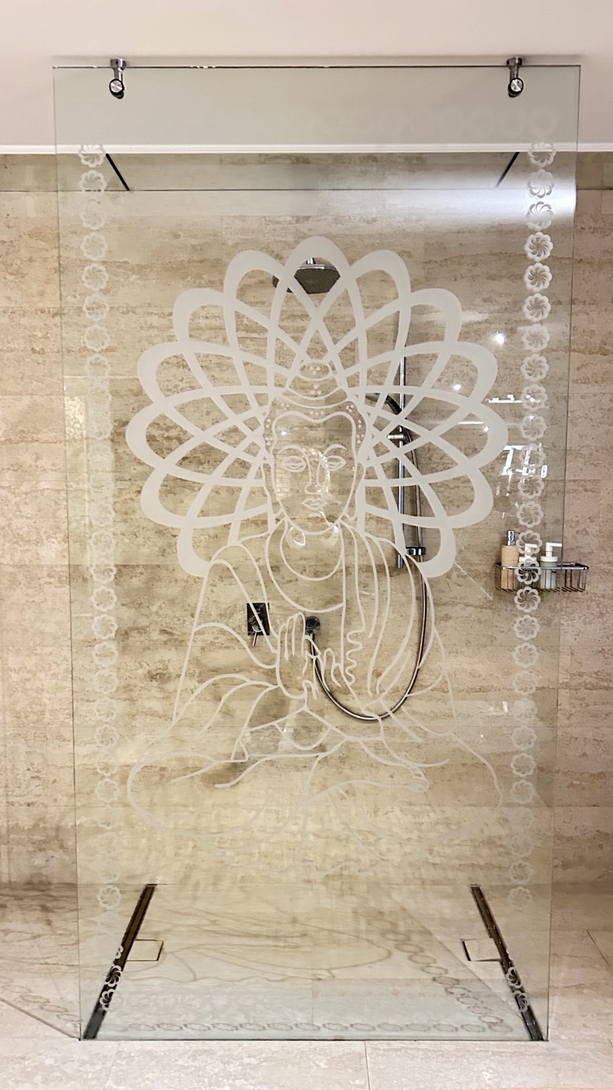 Spa shower with a decorative glass screen