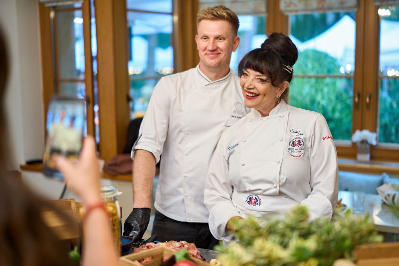 Two chefs at a culinary gathering